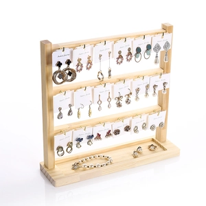 Three-tier solid wood jewelry display stand with hooks for earrings and bracelets