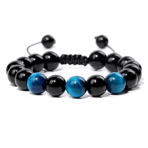 Detail of 10mm tiger eye and black glass beads on adjustable braided bracelet