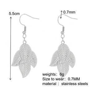 Detailed view of silver leaf pendant earrings in stainless steel with measurement data