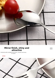 Detailed macro of mirror polished stainless steel spoon and fork for outdoor camping
