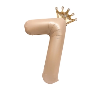 Creamy champagne number 7 foil balloon with mini gold crown for birthday party decor