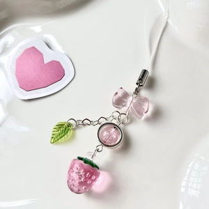 Handmade pink strawberry and bow phone charm with transparent acrylic beads and silver chain