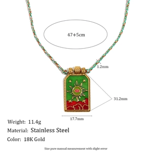 18K gold plated stainless steel sun tarot necklace with colorful woven cord and green enamel