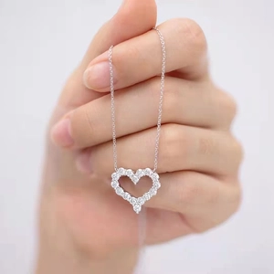 Elegant S925 sterling silver hollow heart necklace with sparkling pavé cubic zirconia gems