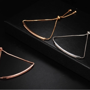 Adjustable zircon paved bar pull bracelets in gold silver and rose gold finishes
