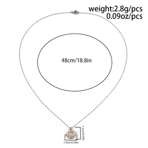 Detail showing crown heart necklace dimensions and chain length of 48cm with weight 2.8g