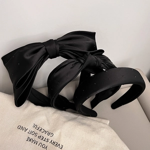 Elegant black satin wide headband set with bow design and small stud embellishments