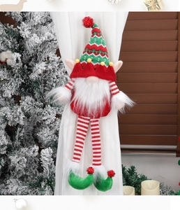 Christmas gnome curtain tieback with red stripes and plush beard on white fabric