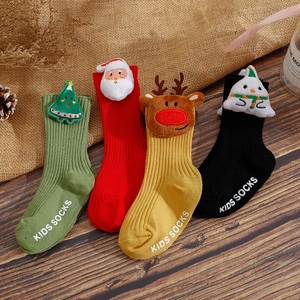 Christmas non-slip baby socks with 3D cartoon dolls in green, red, yellow and black colors