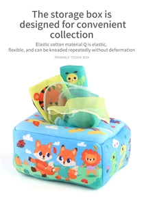 Detail of baby tissue box toy with cute animal prints and colorful sensory scarves