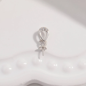 Close-up of S925 sterling silver pendant connector with three sparkling zircon stones