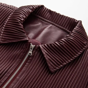 Women's vintage burgundy faux leather jacket with pleated texture and silver zipper detail