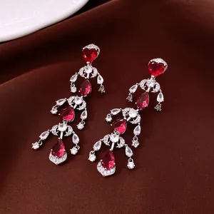 Elegant silver tassel earrings with red heart-shaped zircon and teardrop crystal accents