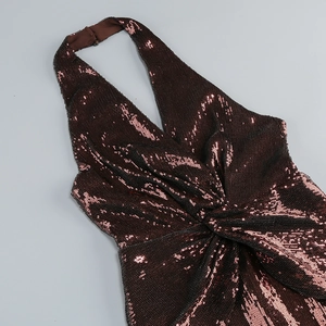Detailed view of bronze sequin halter top with twist front and reflective metallic finish