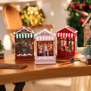 Christmas musical snow globe coffee house decor with glowing LED light and festive bokehs