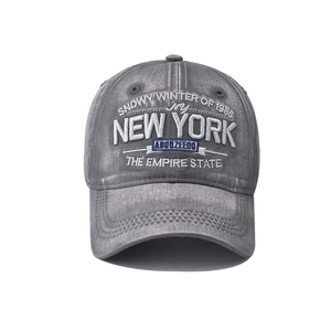 Detail of vintage washed gray baseball cap featuring premium 3D New York embroidery