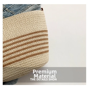 Close-up of premium striped woven texture and natural straw material on beach bucket bag