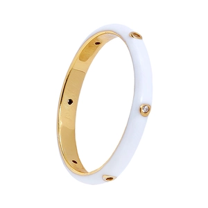 Detail of white enamel and gold-plated ring featuring embedded round zircons
