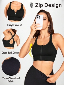 Detail view of black sports bra featuring a zip-front closure and 3D textured fabric