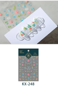 Detailed macro view of 5D floral nail stickers with pink blooms and 3D textured relief