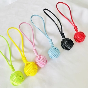 Handmade woven monkey fist knot keychains in multiple vibrant colors for DIY accessories