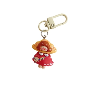 Cute cartoon girl keychain with red polka dot dress and creamy metal D-ring buckle