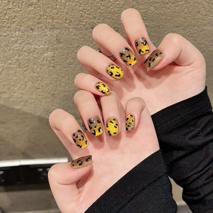 Handmade leopard print cat eye press-on nails with shimmering gold and brown finish