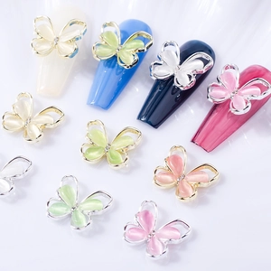 3D cat eye stone butterfly nail charms with rhinestones on multi-colored tips