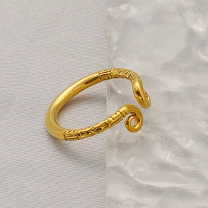 Detailed view of the vintage Monkey King ring with golden cloud pattern texture