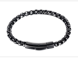 Close-up of black stainless steel box chain bracelet with secure press buckle fastener
