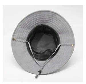 Detail of grey sun hat showing black breathable mesh lining and adjustable windproof rope