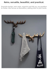 Retro antler wall hooks showing strength by hanging an umbrella and towel