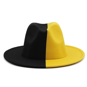 Two-tone black and yellow felt jazz fedora hat with wide flat brim for fashion styling