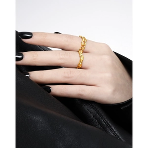 Irregular lava texture gold ring in S925 sterling silver worn on finger with modern style