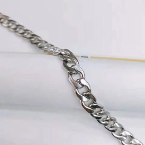 Close-up of a polished silver Cuban link chain made of high-quality stainless steel