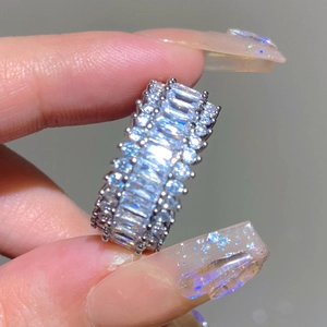 Close-up of luxury baguette and round-cut cubic zirconia paved silver ring