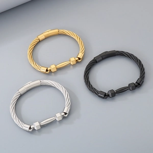 Industrial style cable cuff bracelets for men in gold, silver, and black stainless steel