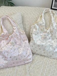 Glossy silk tote bag with cute bear and floral prints in pink and white colors