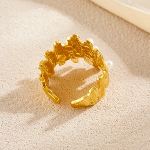 Gold plated stainless steel open ring with textured hammered finish and three white pearls
