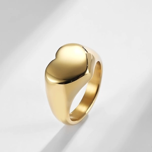 Polished 18K gold plated heart signet ring with a minimalist wide band design