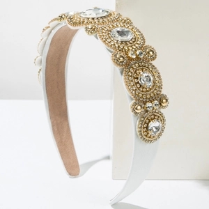 Detailed close-up of Baroque headband featuring white pearls and sparkling crystals