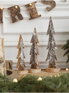 Three-piece wooden Christmas tree set with snow spray finish and solid wood bases