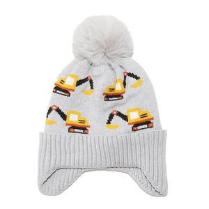 Winter knit child trapper hat with pompom and yellow excavator jacquard pattern