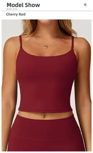 Front view of model wearing cherry red brushed yoga crop top with thin shoulder straps