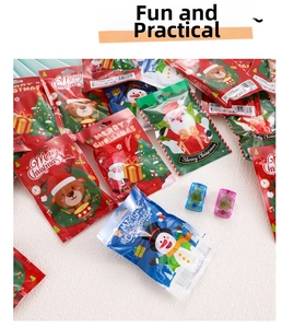Close-up of colorful Christmas stationery blind bags with Santa and reindeer patterns