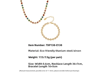 Macro shot of gold-plated titanium steel necklace and bracelet with colorful zircon stones