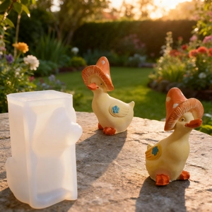 Detailed silicone mold showing finished cute duck figurines with red mushroom hats