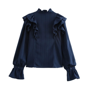 Elegant navy blue ruffled blouse with vintage Victorian collar and flared sleeves