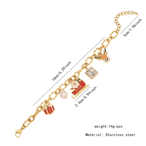 Bracelet à charms de Noël en acier inoxydable avec pendentif renne et père Noël.