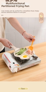 Three-section non-stick maifan stone pan cooking eggs, shrimp, and asparagus on stove